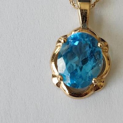 Topaz Earrings and Pendant set in 14K Gold