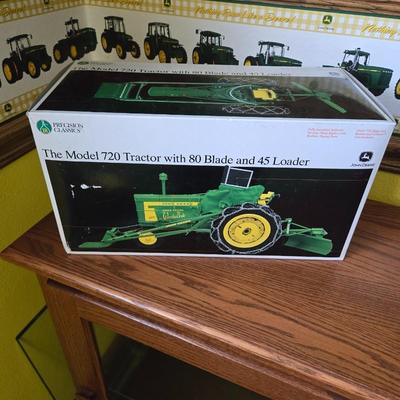 John Deere The Model 720 Tractor with 80 Blade and 45 Loader