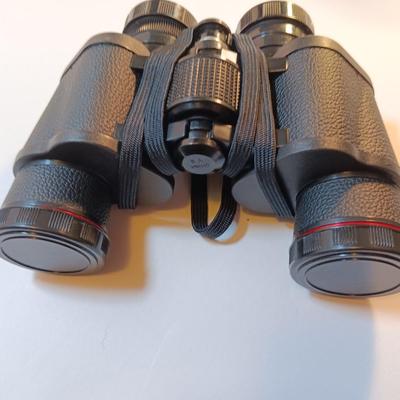 Large sports bag 30" x 14" with a pair of Simmons Binoculars in case