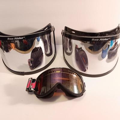Two snow rider shades with a pair of Smith snow goggles