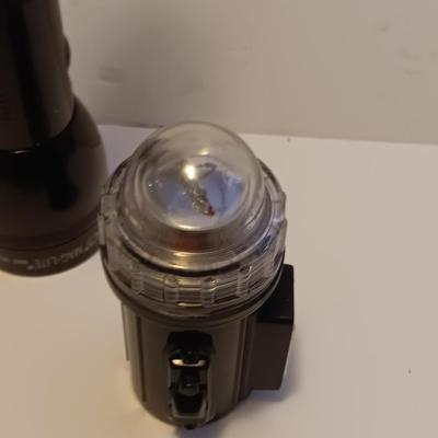 Working Black Maglite with clear distress beacon light