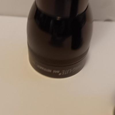 Working Black Maglite with clear distress beacon light