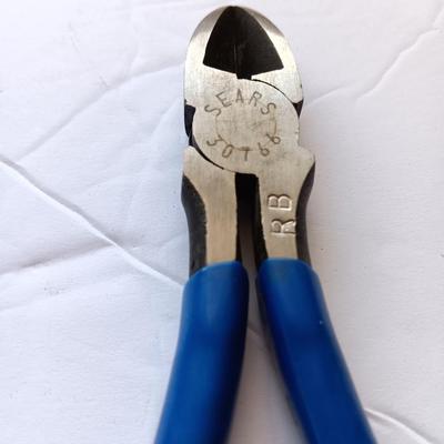 Assortment of pliers with blue handles