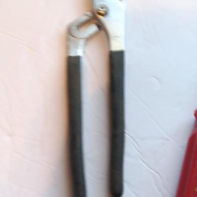 Grouping of hand tools and a tape measure