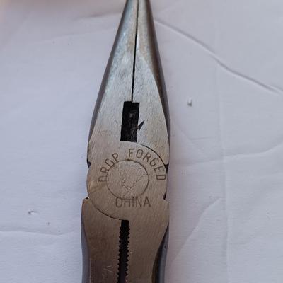 Grouping of hand tools and a tape measure