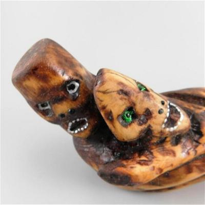 25 6 1/4 Wooden Statue of Pair of Somethings