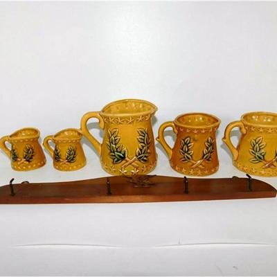 84 Chadwick Measuring Cup Set with Wood Hanger (Has 2 1/2 Cup & 2 1/8 Cup)