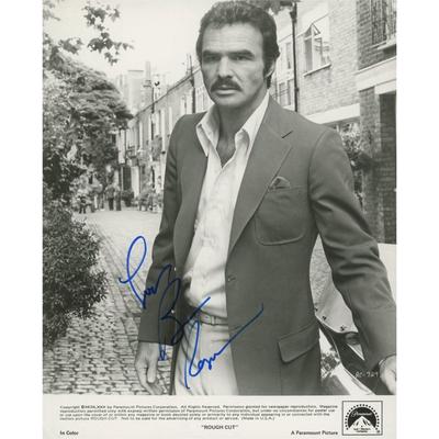 Rough Cut Burt Reynolds signed movie photo. GFA Authenticated