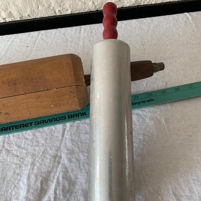 Vintage rolling pins, one really large, the other metal