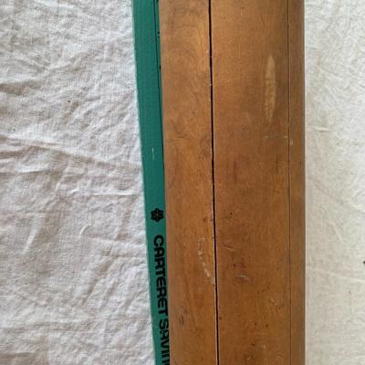 Vintage rolling pins, one really large, the other metal