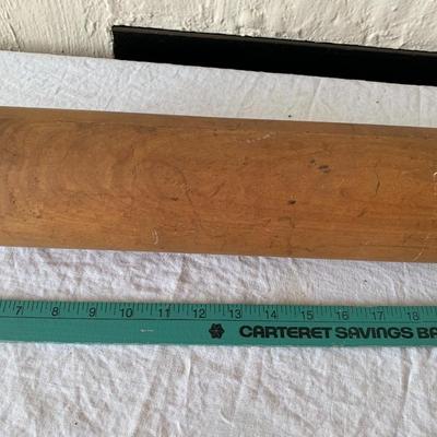 Vintage rolling pins, one really large, the other metal