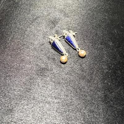 Silver earrings with a blue stones