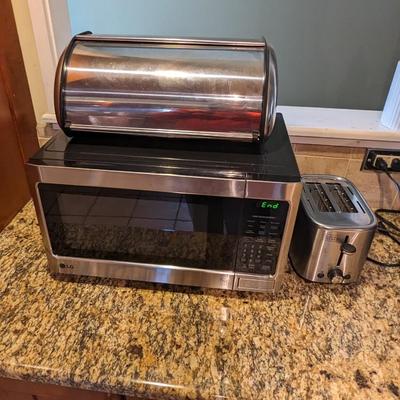 Collection of Kitchen Appliances includes Microwave, Toaster and Bread Box