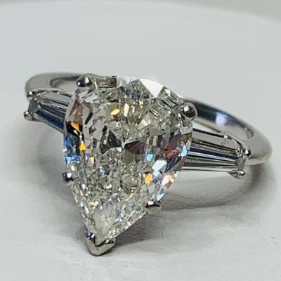 LOT 118: Huge 2.66 carat Pear Shaped Diamond accented by 2 large tapered baguettes set in Platinum, Sz 5.25 -G color -SI2 Clarity
