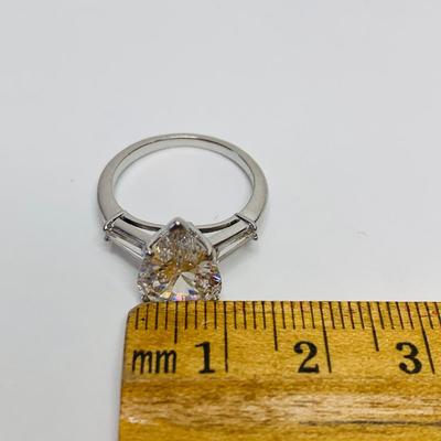 LOT 118: Huge 2.66 carat Pear Shaped Diamond accented by 2 large tapered baguettes set in Platinum, Sz 5.25 -G color -SI2 Clarity