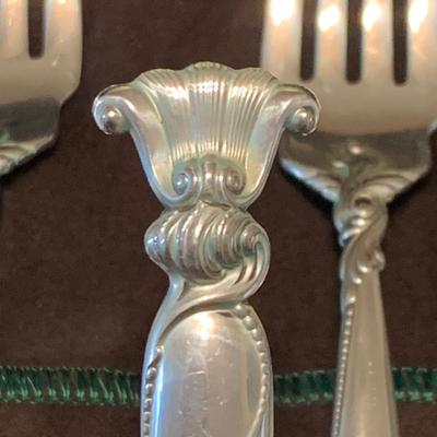 LOT 112: Wallace Sterling Silver Flatware Set, Romance of the Sea, 72 Pieces: 2391.62g Tw.