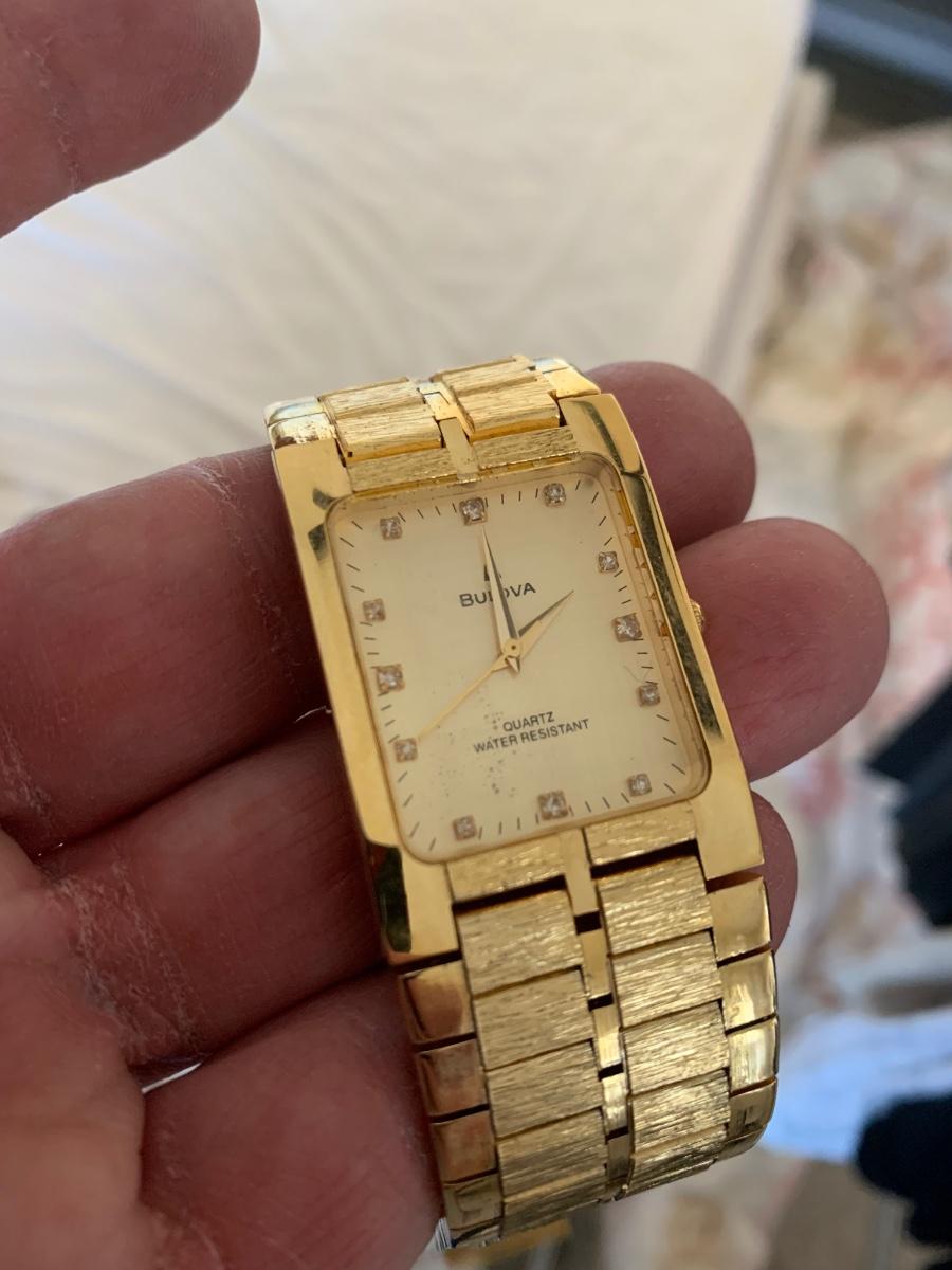 Bulova water deals resistant 18k gold
