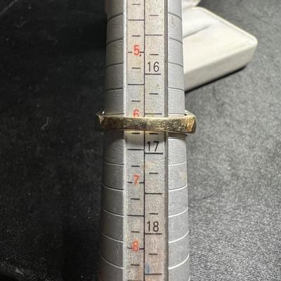 14K Gold ring with baguettes and green stone