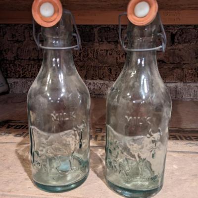 Pair of Vintage Embossed Milk Bottles with Bale Tops