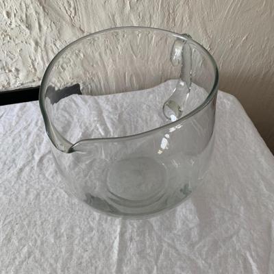 Large glass pitcher, tip jar or fish bowl?