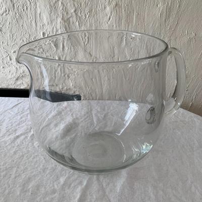 Large glass pitcher, tip jar or fish bowl?
