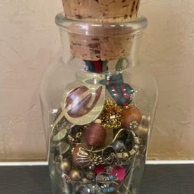 Glass bottle with crafting jewelry
