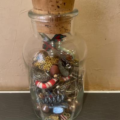 Glass bottle with crafting jewelry