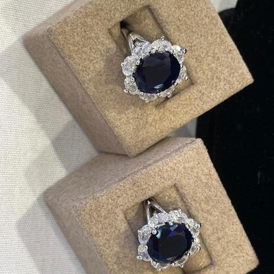 2 dark blue stone rings