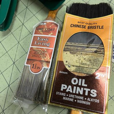 Caulk Gun and Paint Brushes