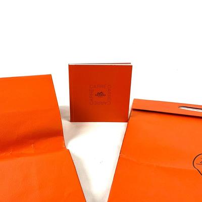 222 Two Authentic HÃˆRMES Orange Folding Handle Bags with Singular Knotting Book