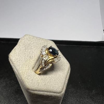 Beautiful 10k Gold Ring with Diamonds and Stone.