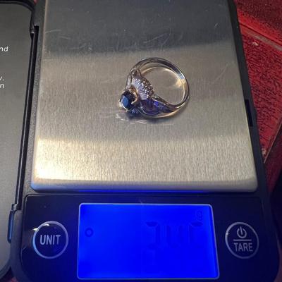 Beautiful 10k Gold Ring with Diamonds and Stone.