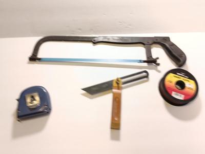 Pro series 25-foot tape measure - Hack saw - Emery cloth roll - and a Stanley adjustable bevel Angle