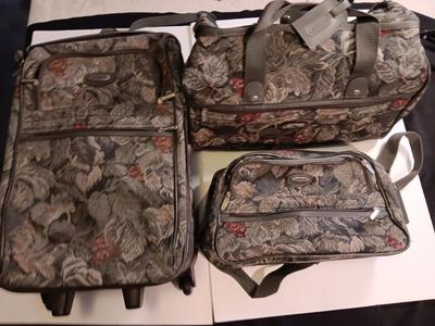 Jaguar Floral patterned Suitcase with matching carry-on bags
