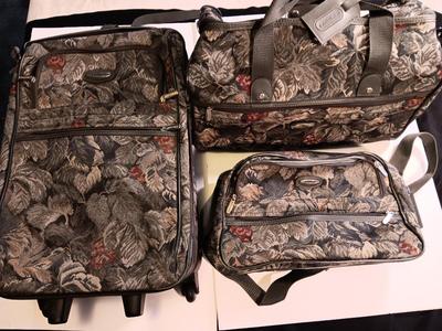 Jaguar Floral patterned Suitcase with matching carry-on bags