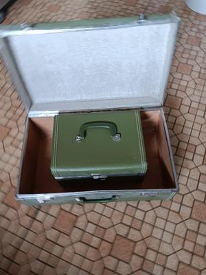 Vintage green suitcase with cosmetic case