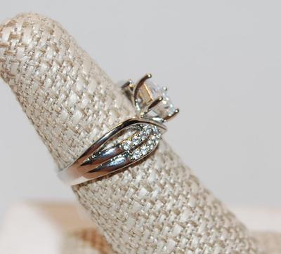 Size 7 Â½ Angled Princess Cut Clear Center Stone with Double Accent Stone Bands .925 (4.6g)