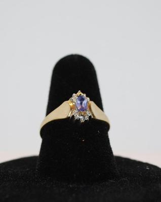 Size: 6Â¾ - 10k GOLD Marquis Shaped Light Purple Amethyst with Single Diamond (1.8g)