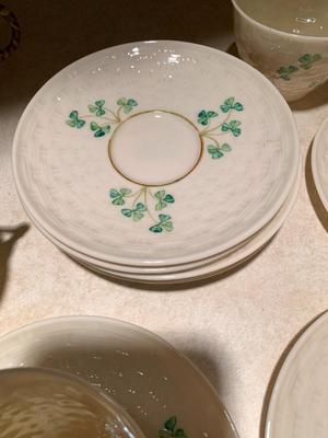 Set of 11 Belleek teacups and 11 saucers