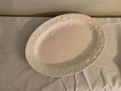 Assortment of large white serving platters