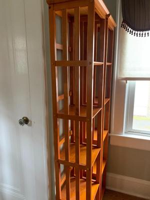 Pair of tall , narrow bookcases