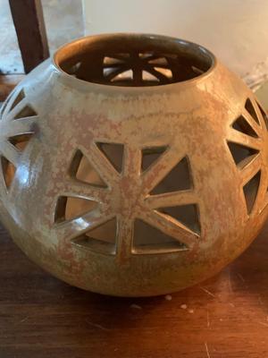 Ceramic vase with pierced design or large candle holder