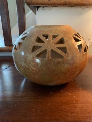 Ceramic vase with pierced design or large candle holder
