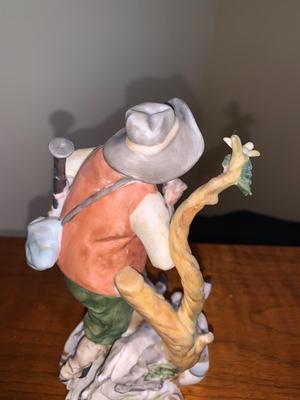 Vintage Bisque figure hunter with dog