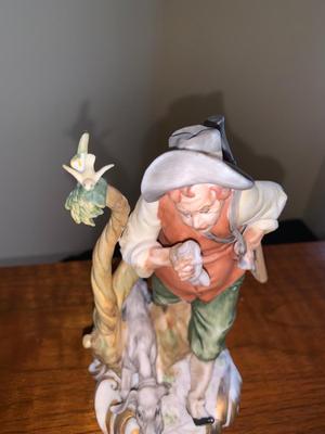 Vintage Bisque figure hunter with dog