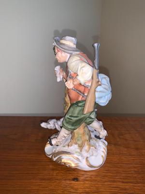 Vintage Bisque figure hunter with dog