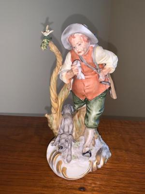 Vintage Bisque figure hunter with dog