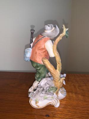 Vintage Bisque figure hunter with dog