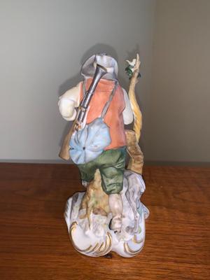 Vintage Bisque figure hunter with dog