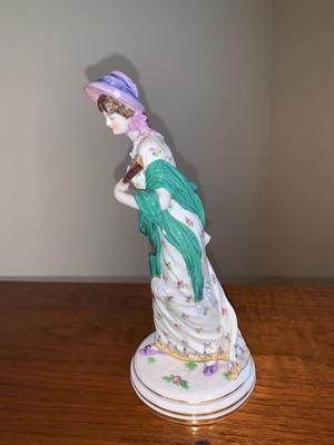 Porcelain figure of woman with shawl and hat, Meissen Crossed Swords Mark